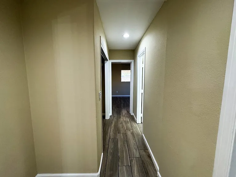 HALLWAY VIEW TOWARDS MASTER BEDROOM