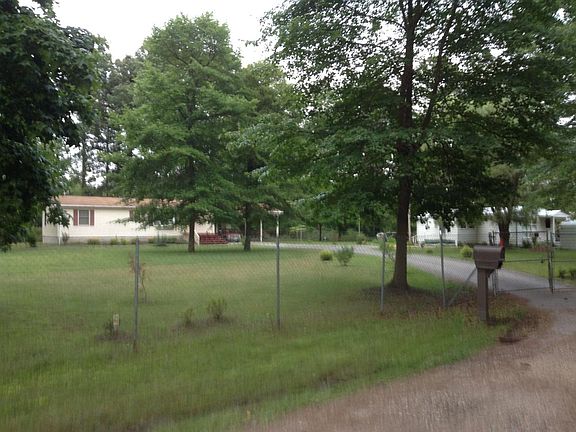 House front; high fenced yard