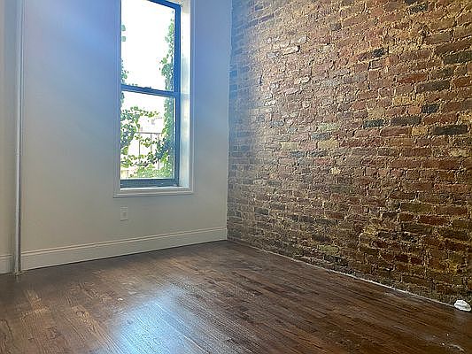 5th image of 215 E 4th St APT 21