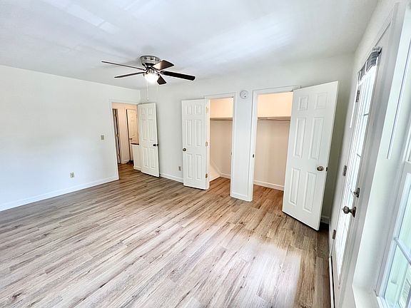 Primary Bedroom (Upstairs - Front with Balcony)