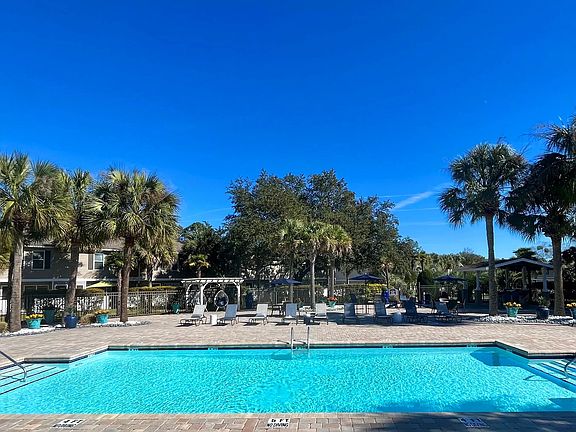 Immerse in the joy of our resort-style pool and expansive sundecka sunlit tropical paradise.