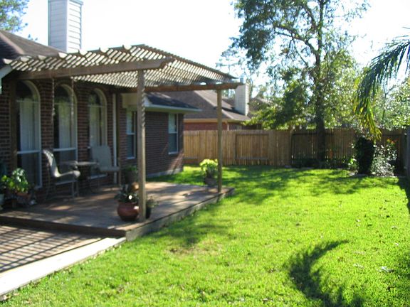 Backyard w/ covered deck