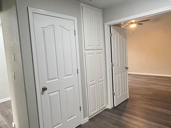 Hallway leading to Master bedroom's French doors.