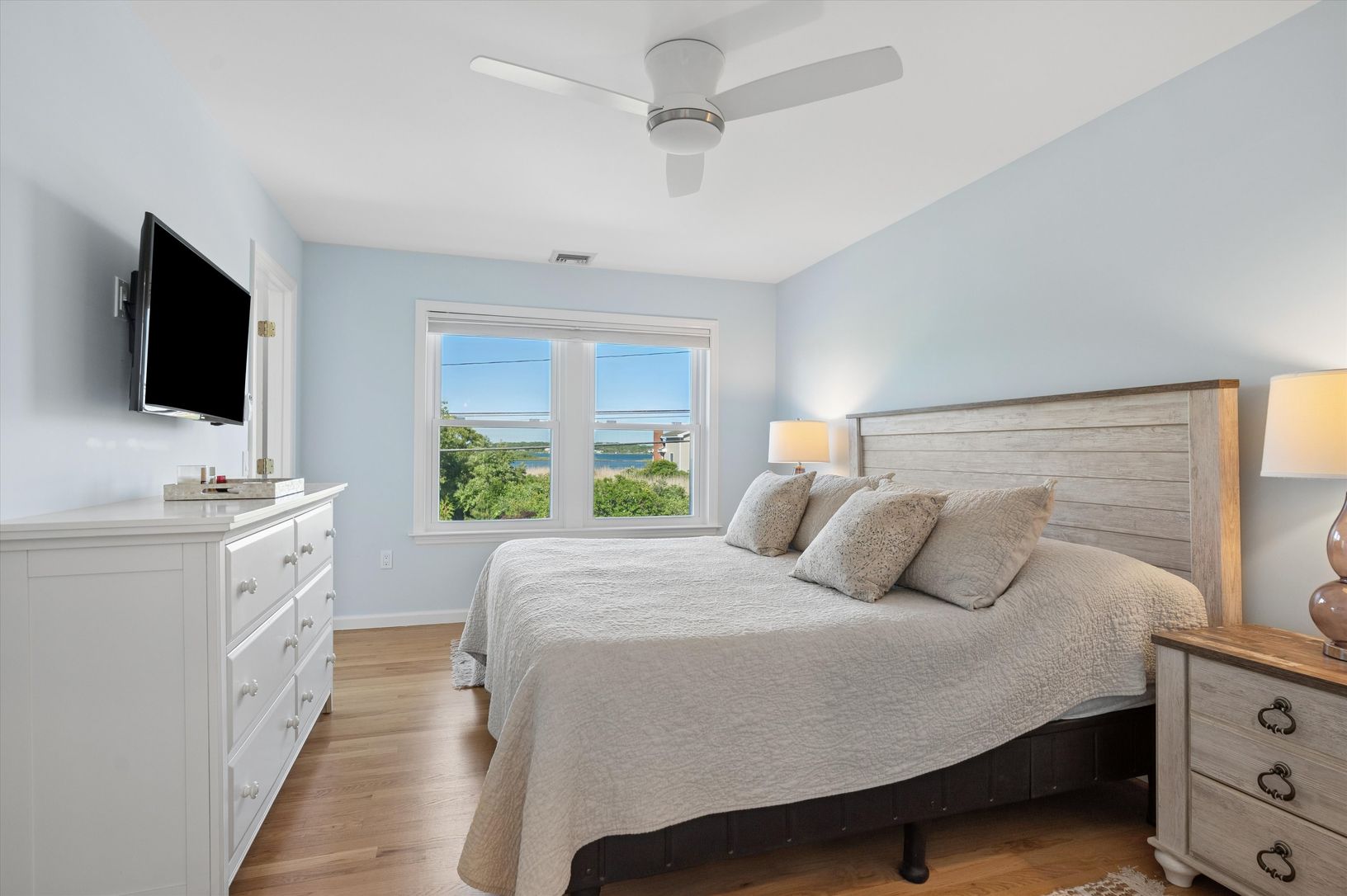 Primary bedroom with lake views