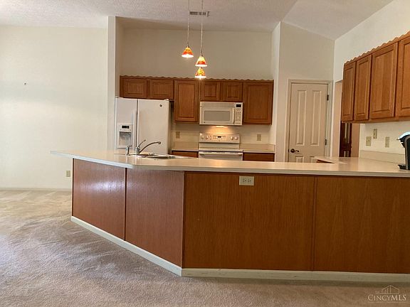 Equipped Kitchen with Pantry. Walkout to Laundry Room and Garage.