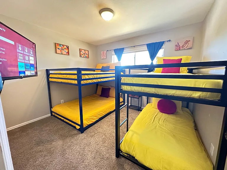 Perfect for Groups! _ Accommodate your friends or family with two bunk beds that sleep four guests comfortably, plus a smart TV for entertainment.