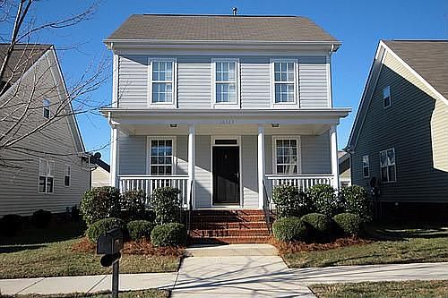 Charming Rocking Chair Covered Front Porch