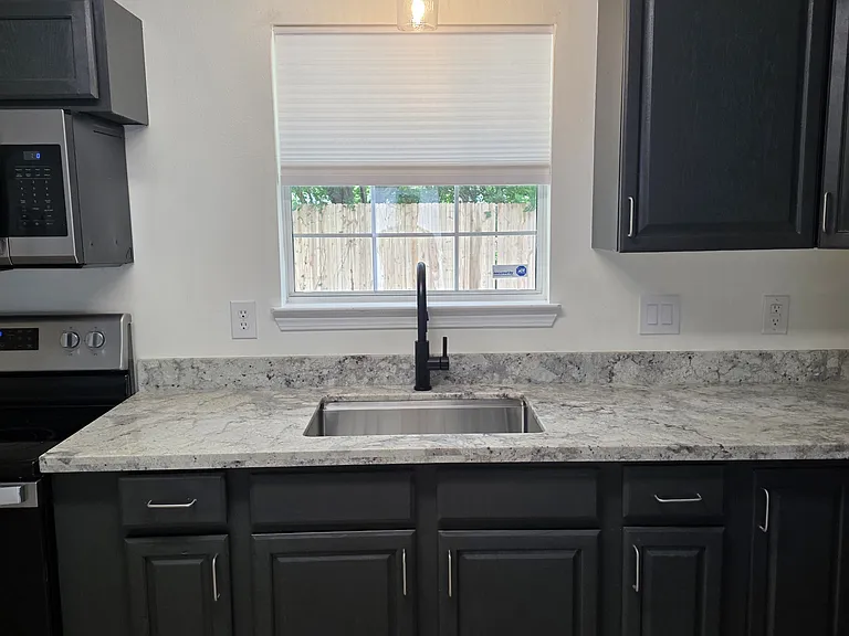 New granite, sink and faucet