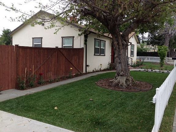 New Landscaping and New Natural Wood Fence