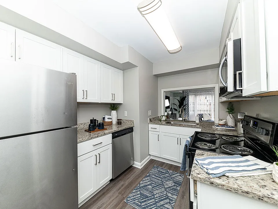Kitchen with granite counters and stainless appliances
