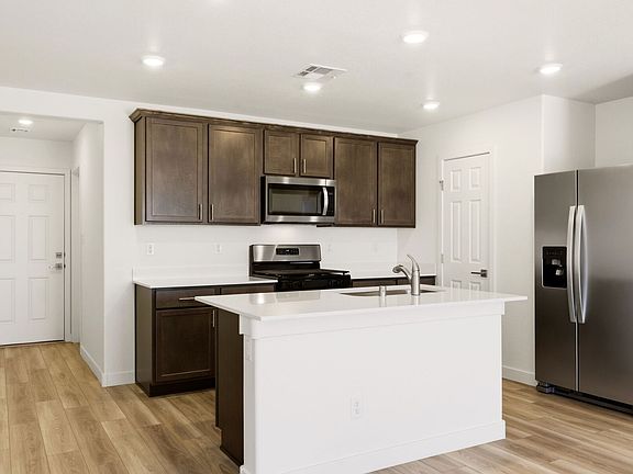 A spacious breakfast bar is the perfect space for a quick meal.