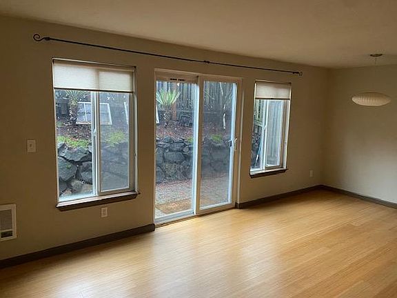 Large windows run throughout the unit, flooding it with light.