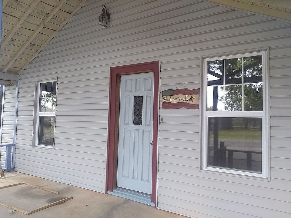 covered porch with vinyl win