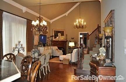 Soaring Open Concept
						:
						Enhanced by upgraded and Custom Lighting