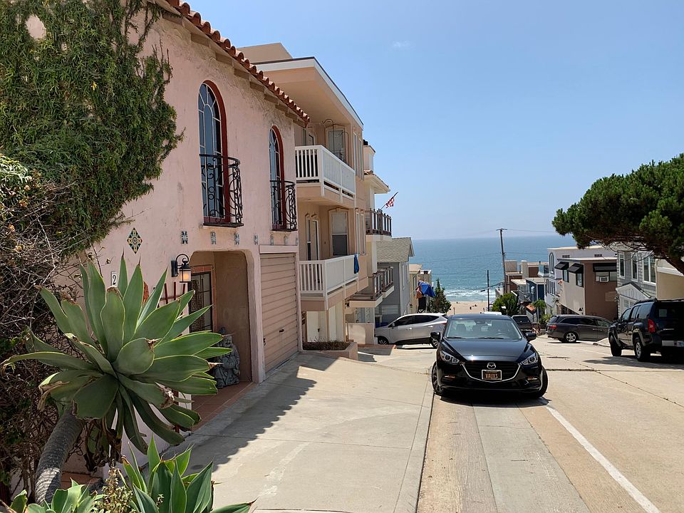 Ocean view from the front of the Enchanting Spanish Duplex. Our property includes 2 private apartments. The beach is literally 100 steps from the front door!
