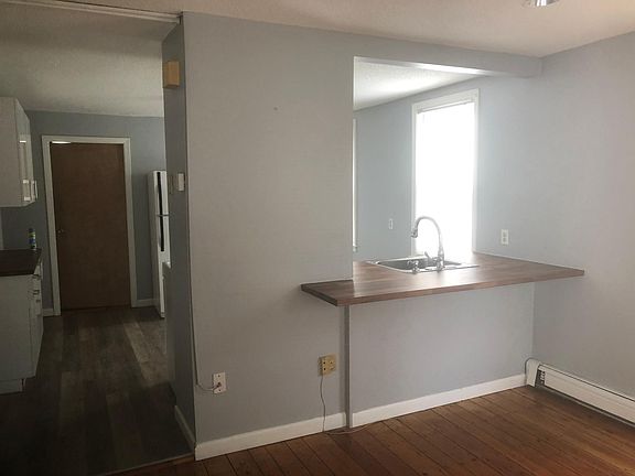 Kitchen Bar Area and Living Room