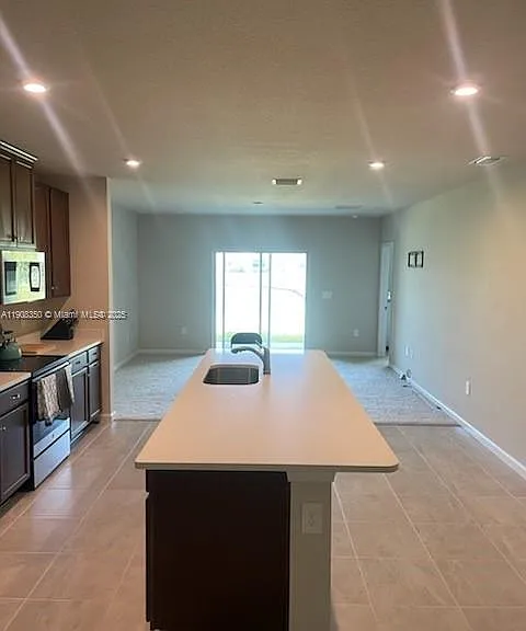 9509 SW Libertas Way — Photo 3