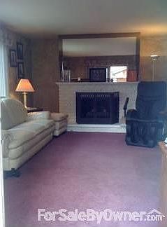 Cozy Family Room : Natural/Gas fireplace.