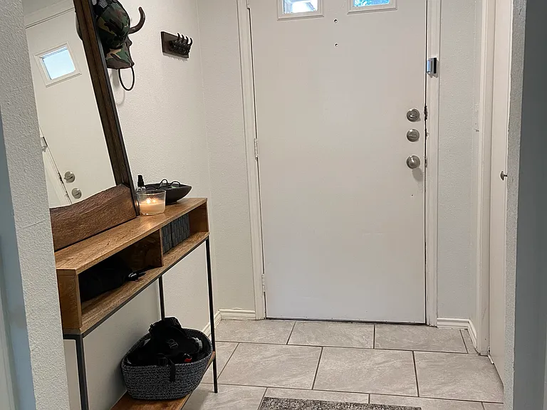 Entryway with large coat closet