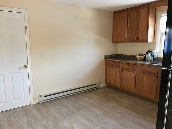 Kitchen exits to garage on lower floor