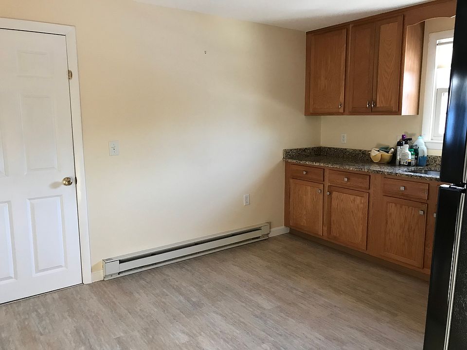Kitchen exits to garage on lower floor