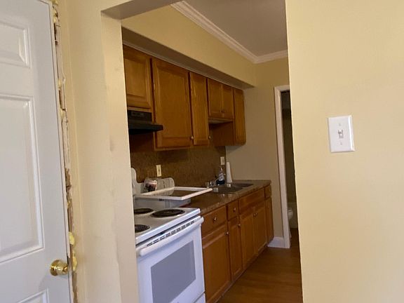 door into the living room and kitchen to the left