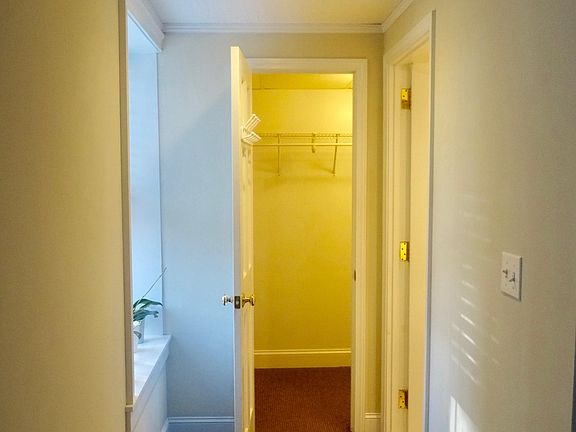 from Bedroom to walk in closet and bathroom door on right