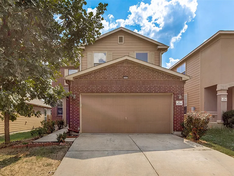 6209 Garden Rose Path — Photo 1