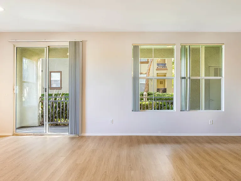 Living Room with Balcony and Hard Surface Flooring