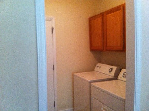 Laundry room with pantry
