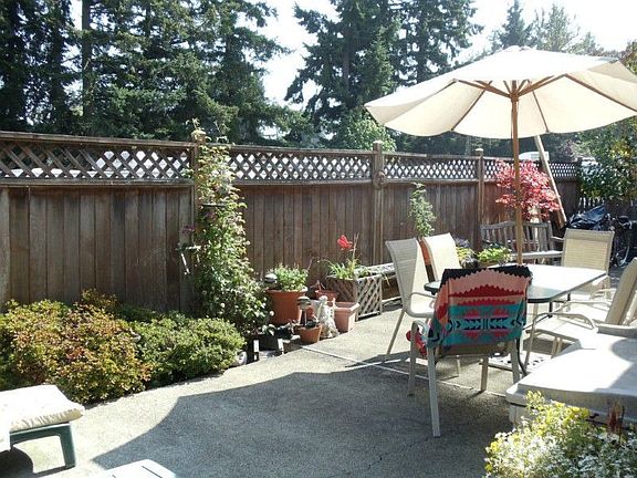 Another view of private fenced back yard patio.