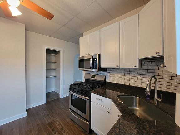 New stainless sink, large walk-in pantry