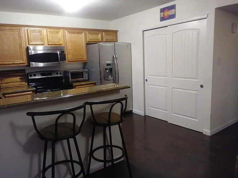 Kitchen w/ Stainless Steel Appliances and Pantry / Full-Size LG Washer and Dryer