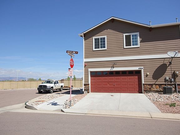 Back of home with oversized 2 car garage