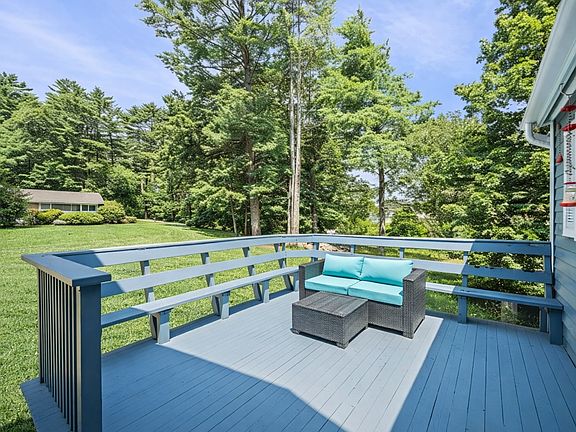 Welcoming front porch over looking the yard