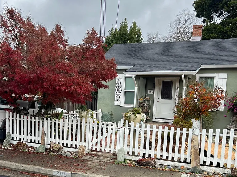 Unit for rent is located in the back.