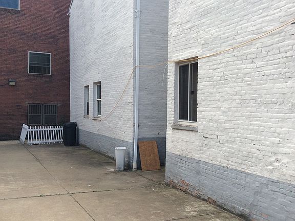 Behind three houses