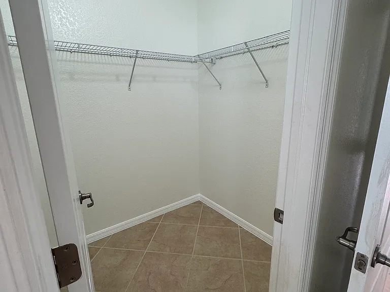 Master Closet 1 of 2 - HIS