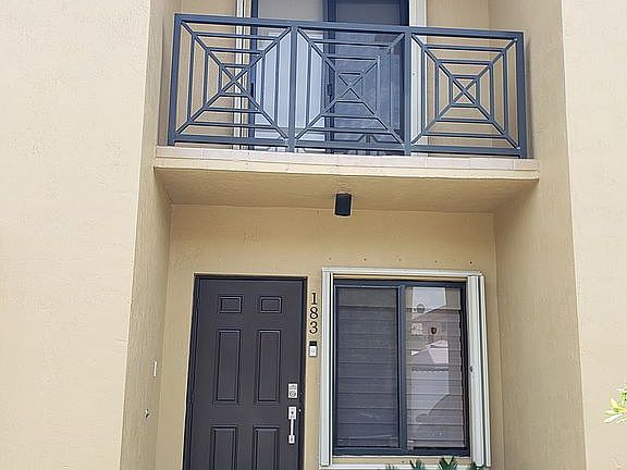 bedroom with balcony