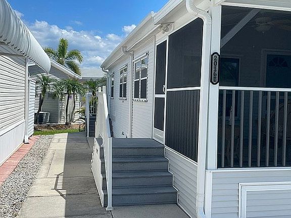 Side entrance. Screen Room.