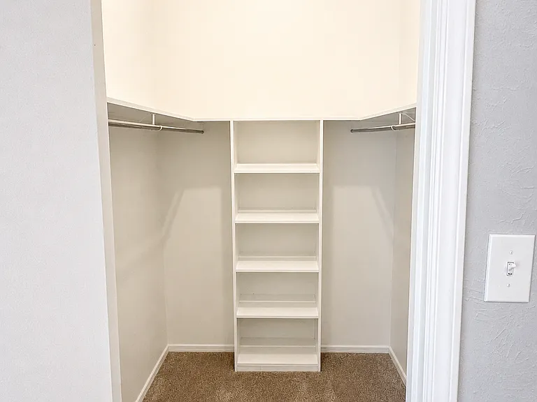 Walk-in closet for 2nd bedroom.