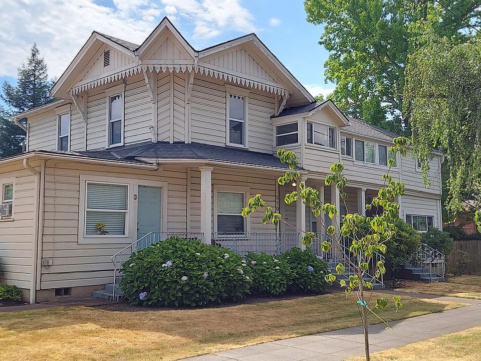 Apartment occupies the upper story at the near (north) end of the house in this photo.