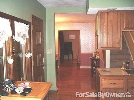 Hard Woods
						:
						Looking from kitchen table into Living Room; hard woods throughout first floor.