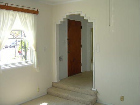 Entry Hall to Step Down Living Room