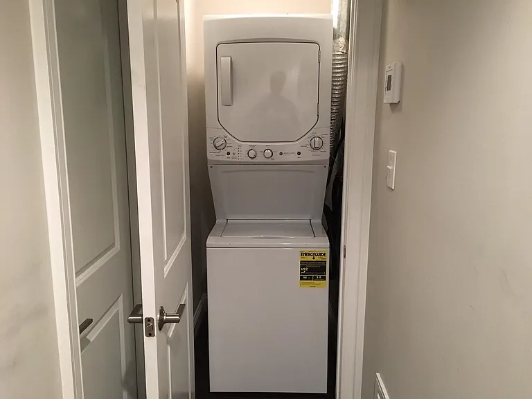 Washer and drier (outside bedroom 2)