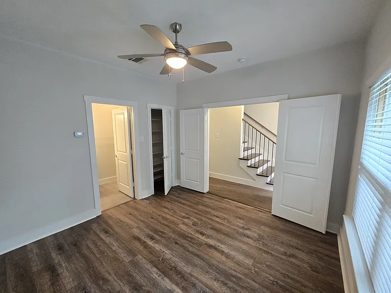 bedroom on ground floor with full bath