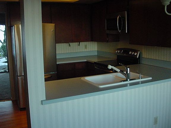 Kitchen opens to eating area