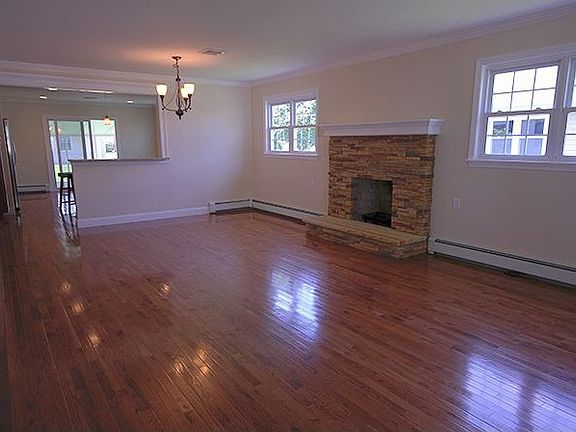 Dining room with view of the custom stone fireplace