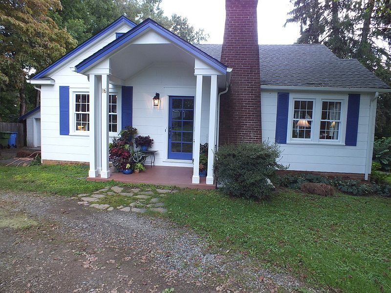 Front View : Freshly painted cottage home in convenient neighborhood close to conveniences.