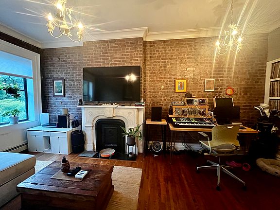 Large living room with space for a work space(s), (and dining area depending on furniture layout)